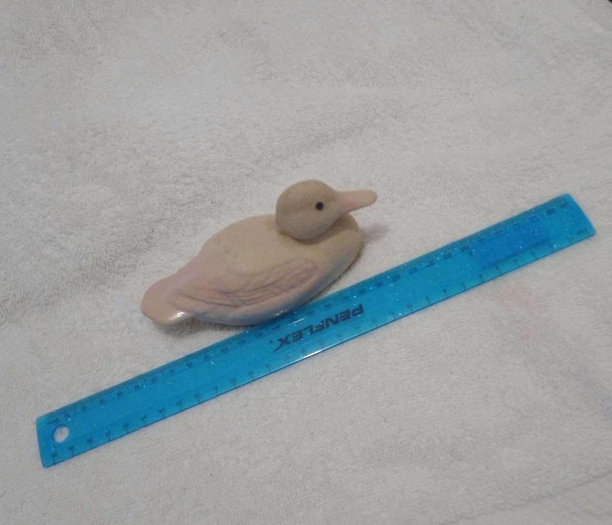 Unique Art Decor Pink Ceramic Duck With a Shade of Blue on Bottom