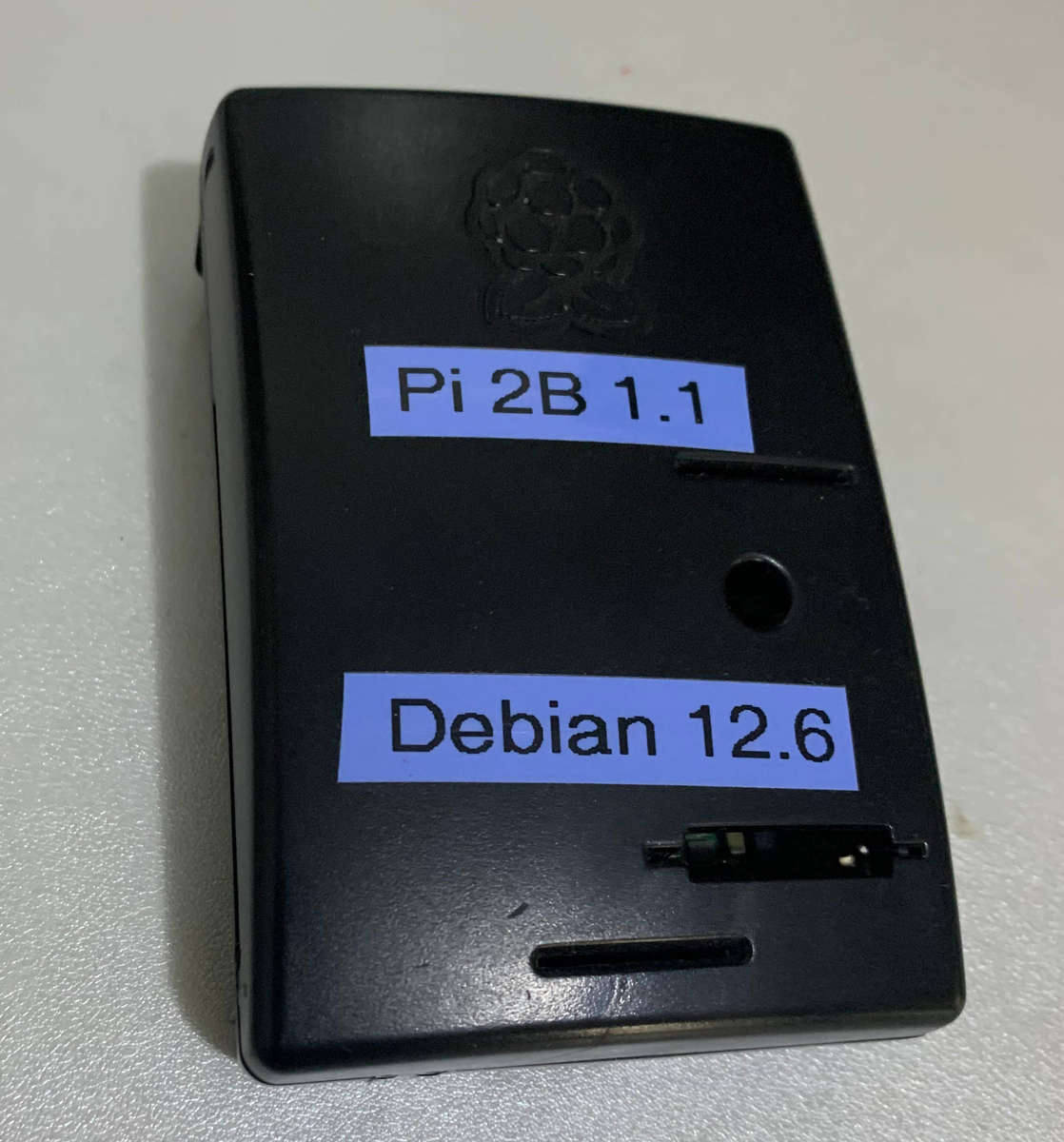 The Raspberry Pi 2 Model B v1.1, 8Gb chip, debian12.6,  with case no PSU