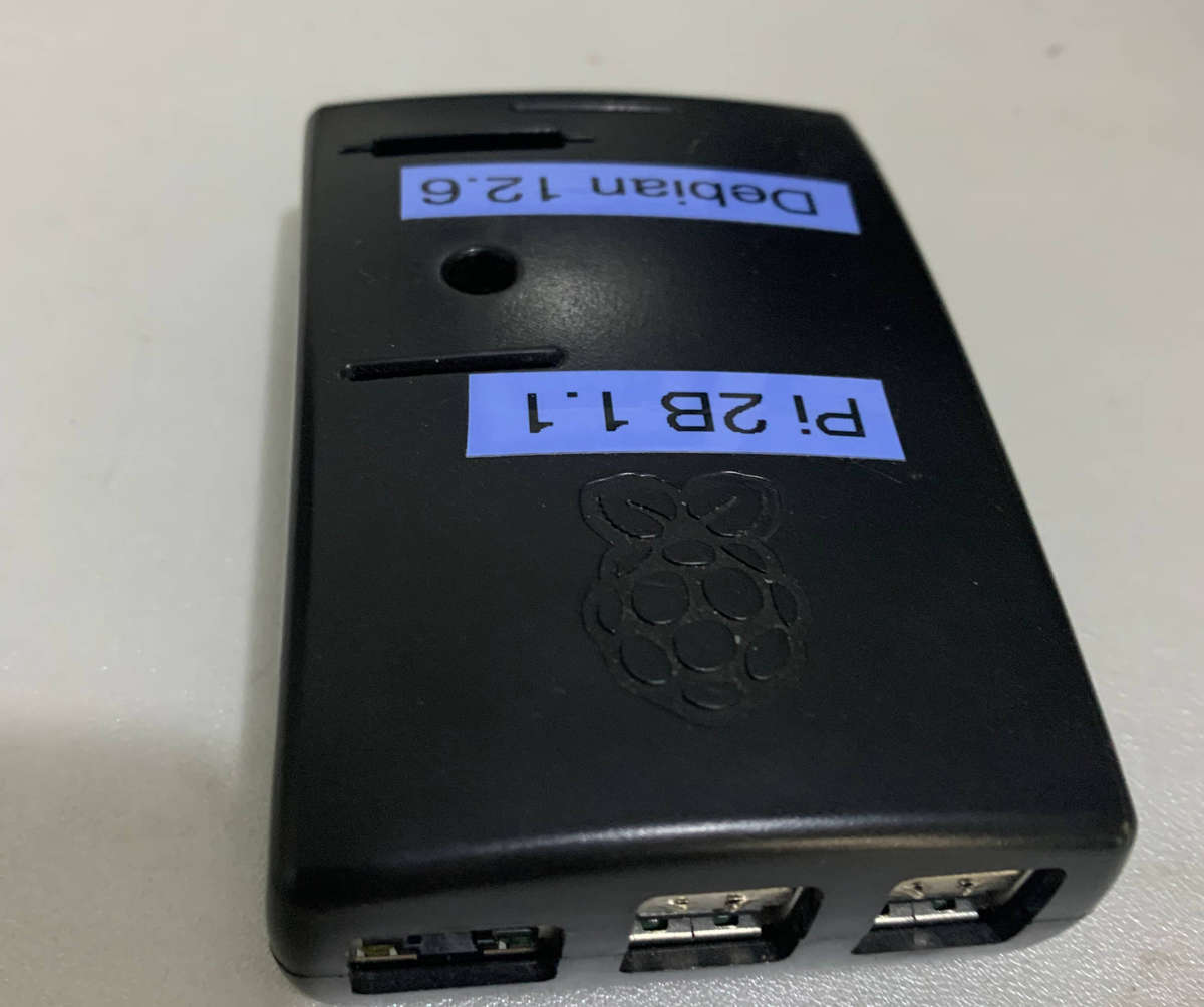 The Raspberry Pi 2 Model B v1.1, 8Gb chip, debian12.6,  with case no PSU