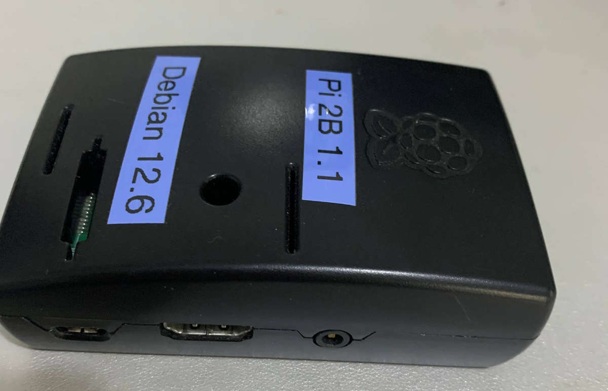 The Raspberry Pi 2 Model B v1.1, 8Gb chip, debian12.6,  with case no PSU