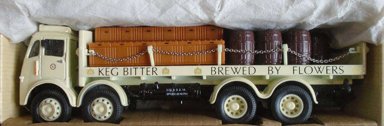 CORGI 1/50 SCALE - ERF FLATBED WITH CHAINS/BARRELS , BOXED