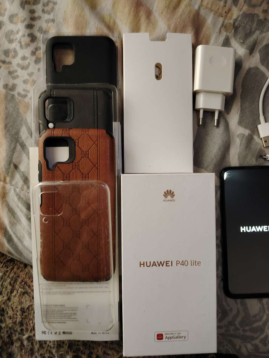 HUAWEI P40 lite *Excellent condition* + 4 COVERS + BOX & Charger