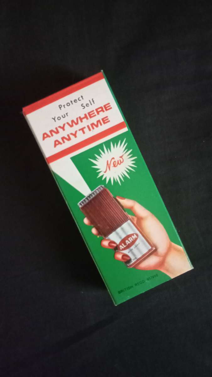 personal defense alarm and light