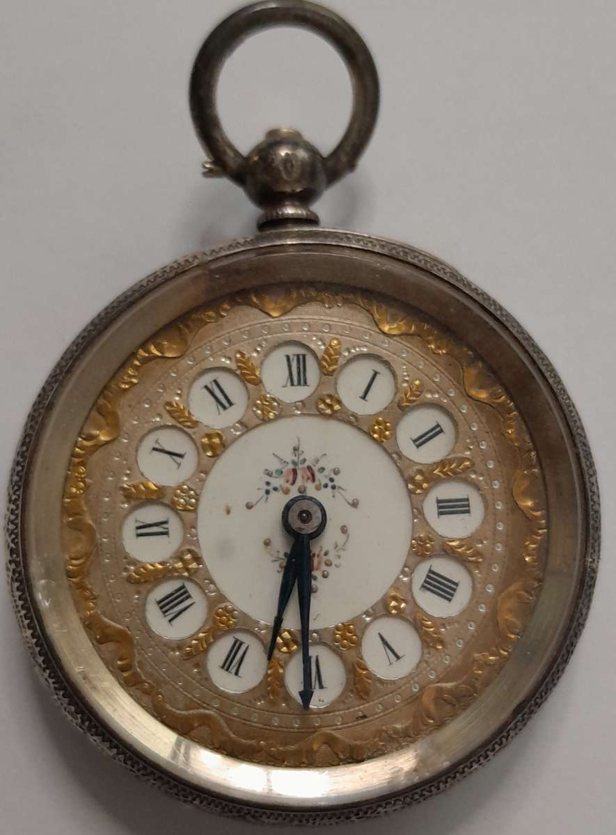 Vintage silver casing decorative and ornate swiss made pocket watch