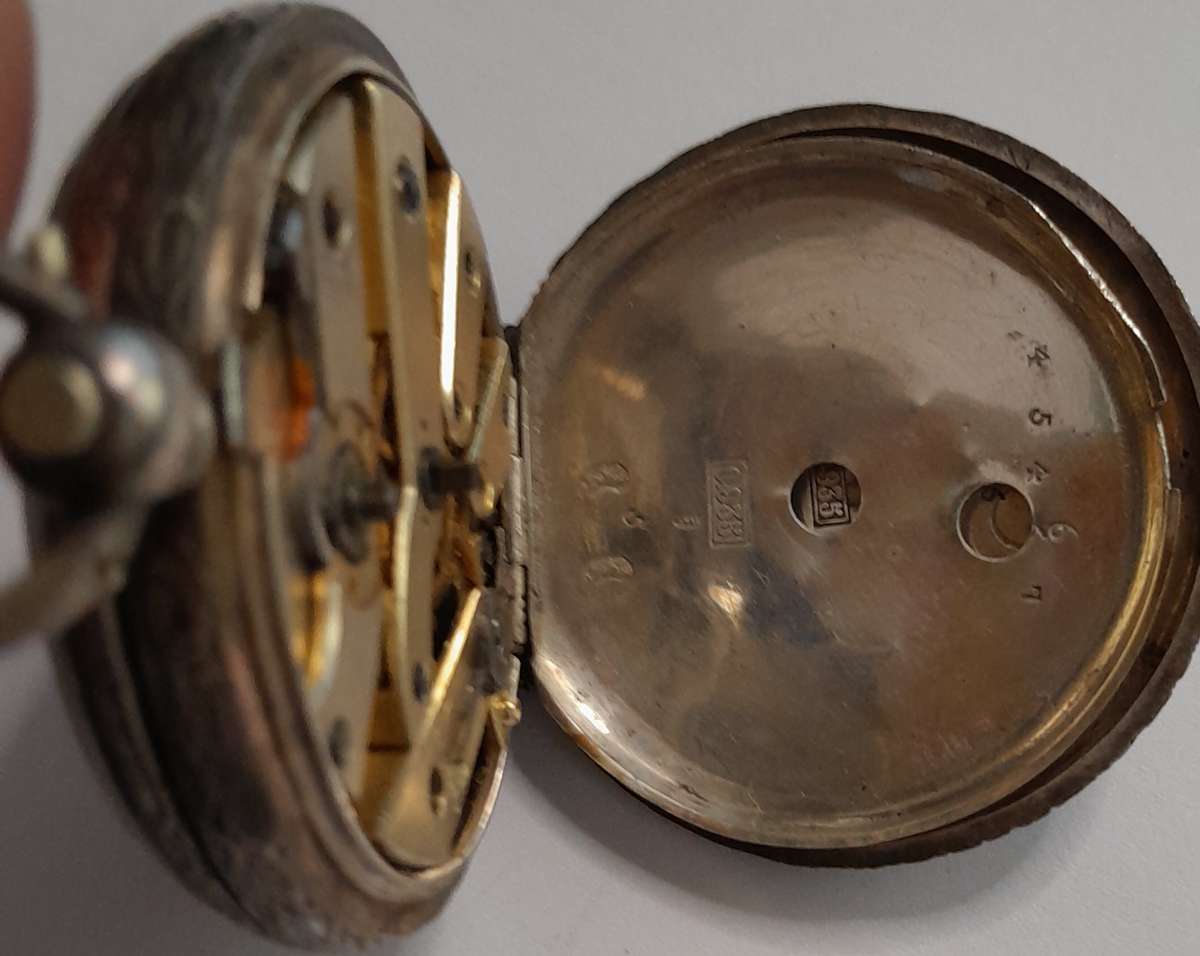 Vintage silver casing decorative and ornate swiss made pocket watch