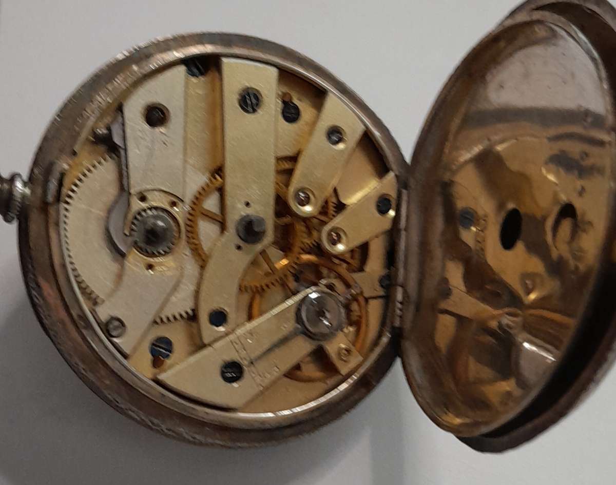 Vintage silver casing decorative and ornate swiss made pocket watch