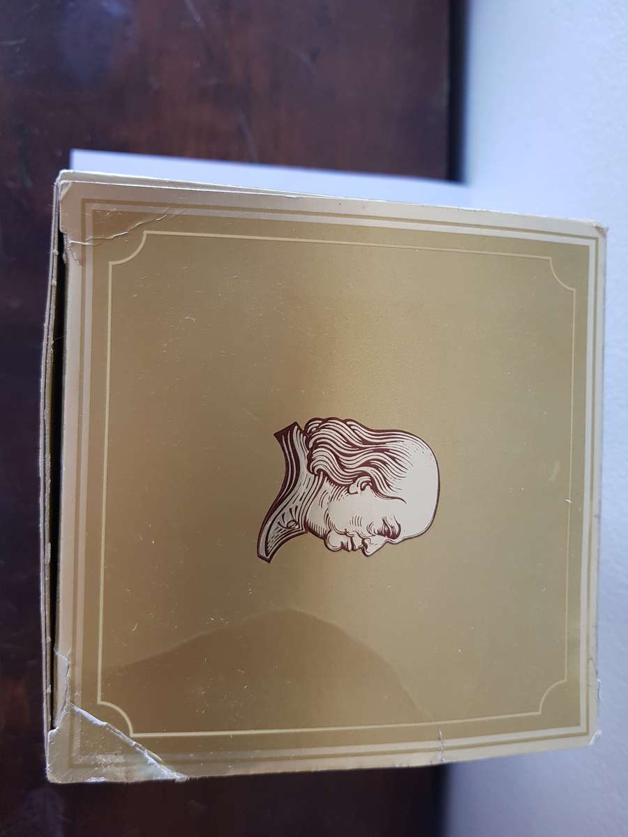 VINTAGE OUDEMEESTER SOUVEREIN POTSTILLED 12 YEAR OLD BRANDY IN UNIQUE SHAPED DECANTER.