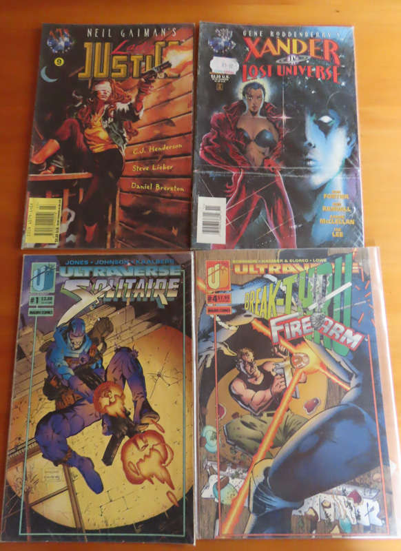 Comics -4 comics in plastic sleeve never read # 1