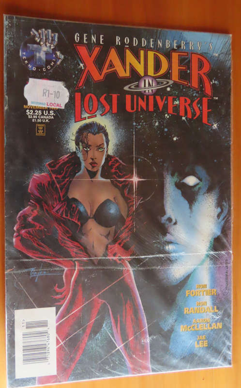 Comics -4 comics in plastic sleeve never read # 1