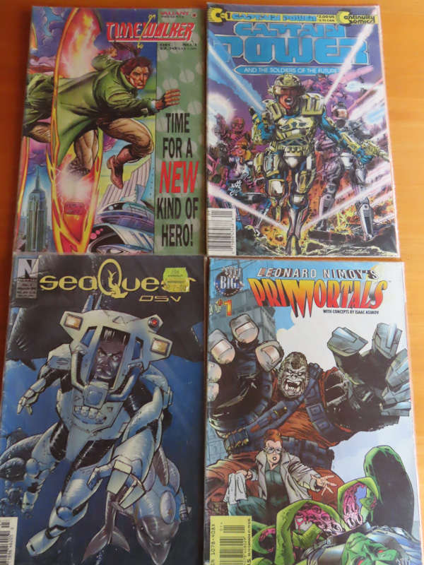 Comics -4 comics in plastic sleeve never read # 6