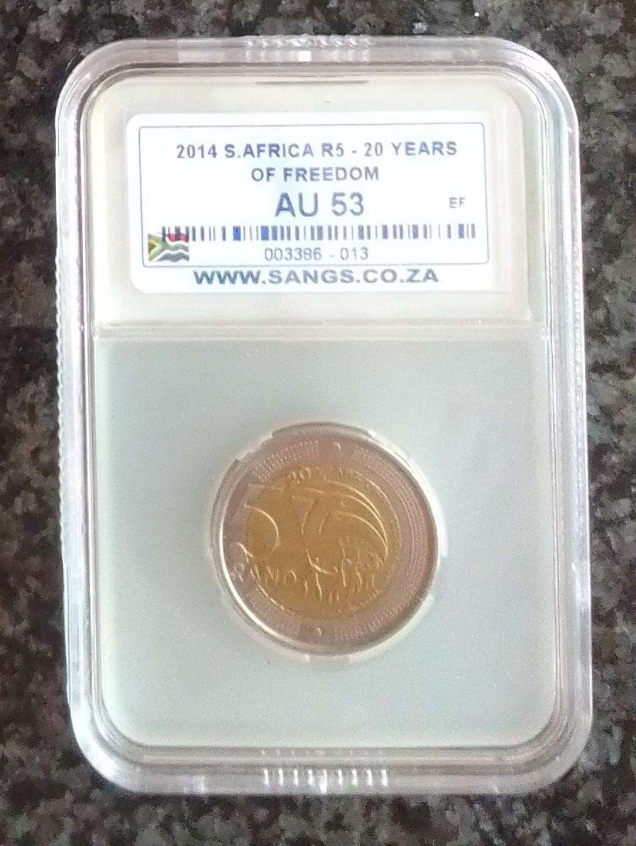 2014 South Africa 20 Years of Freedom R5 Coin - Graded AU53
