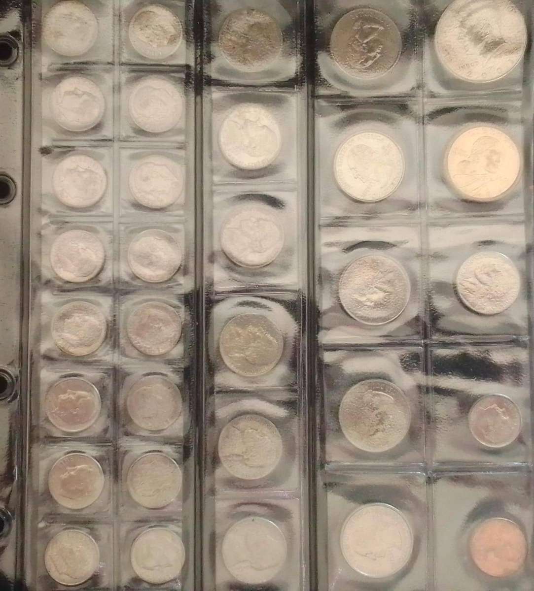 American Coin set in plastic sleeve with 32 coins