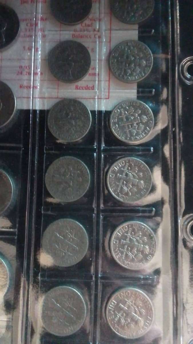 American Coin set in plastic sleeve with 32 coins