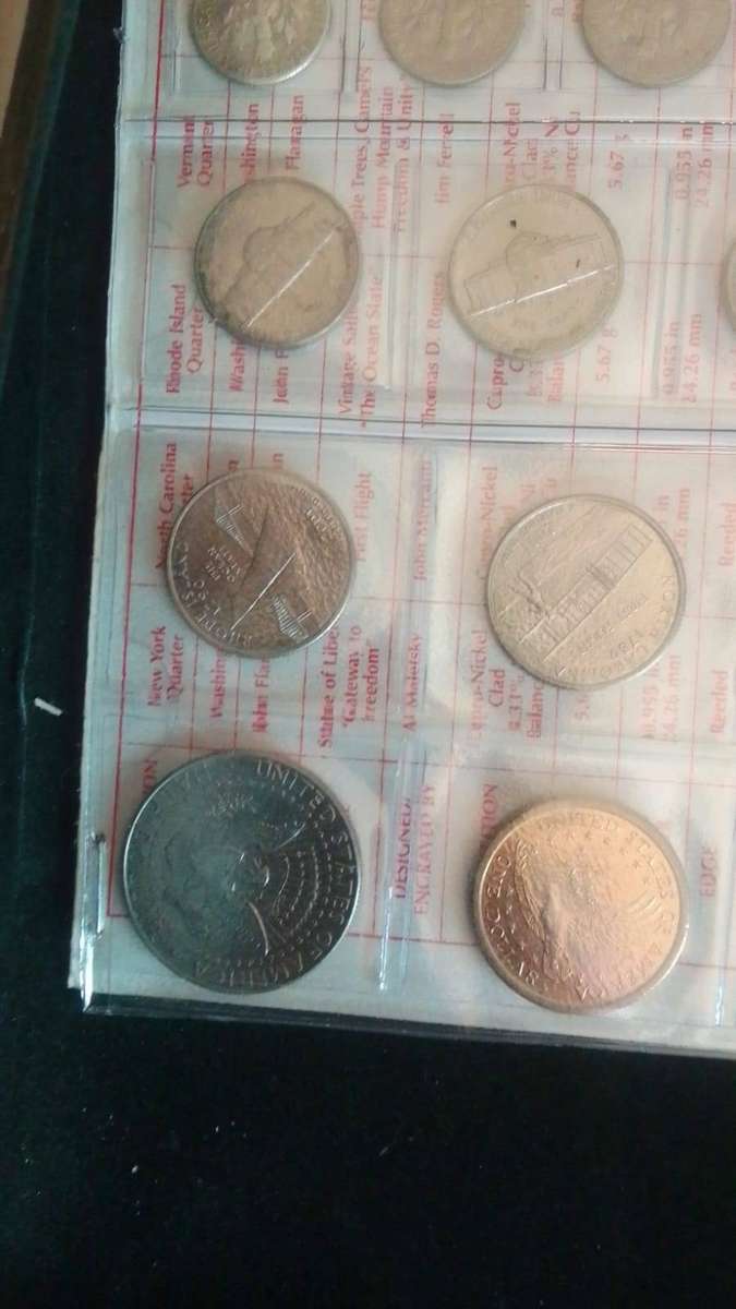 American Coin set in plastic sleeve with 32 coins