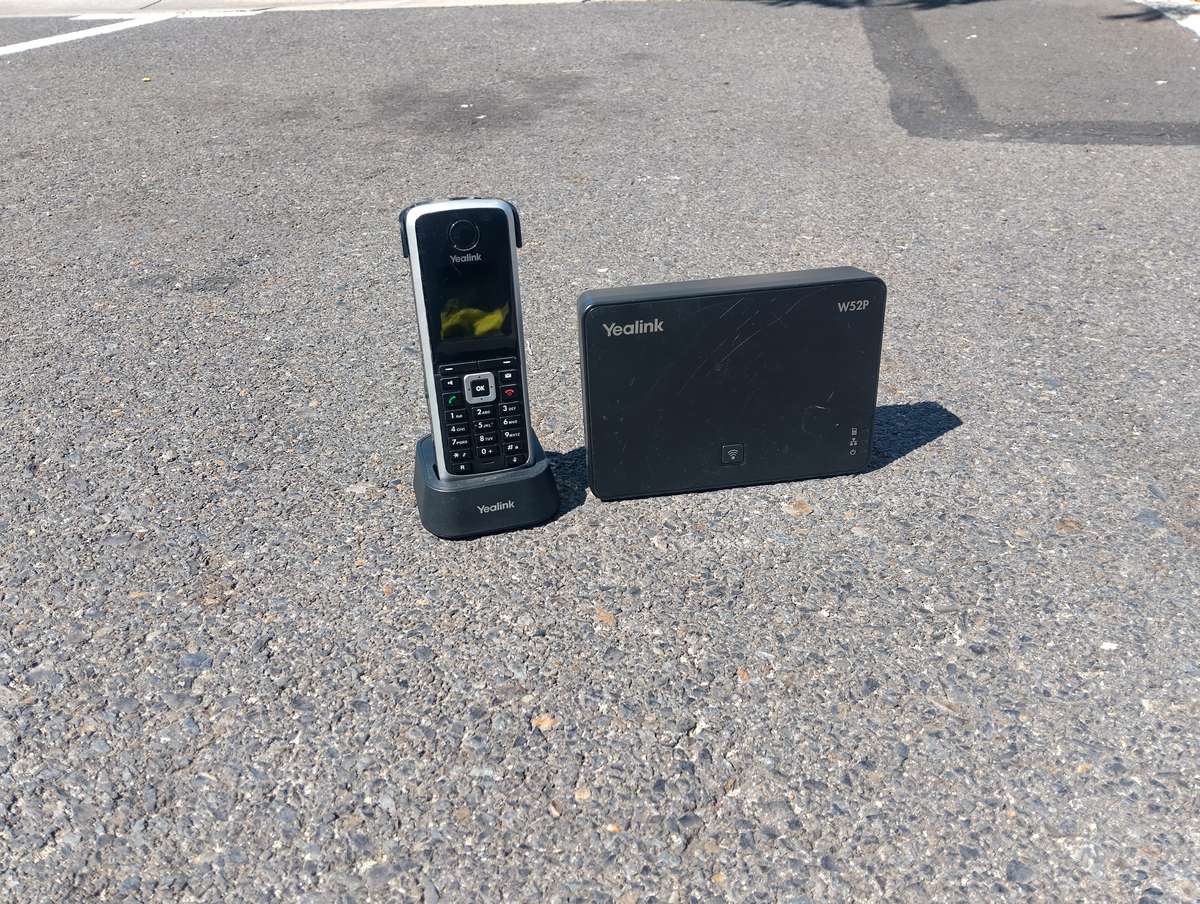 Yealink W52P Cordless phone with base, chargers, and Dect cordless handset