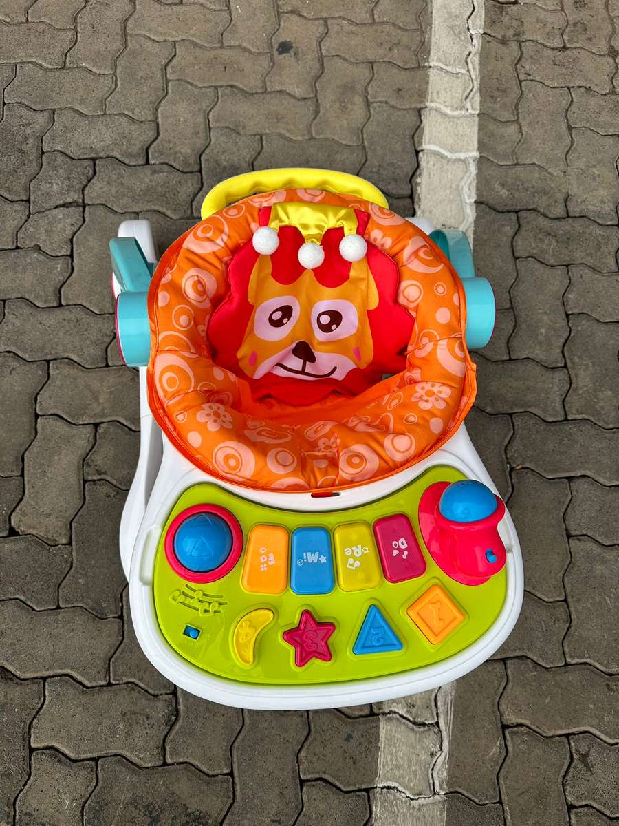 4-In-1 Multi-Functional Baby Push Walker with Music Entertainment