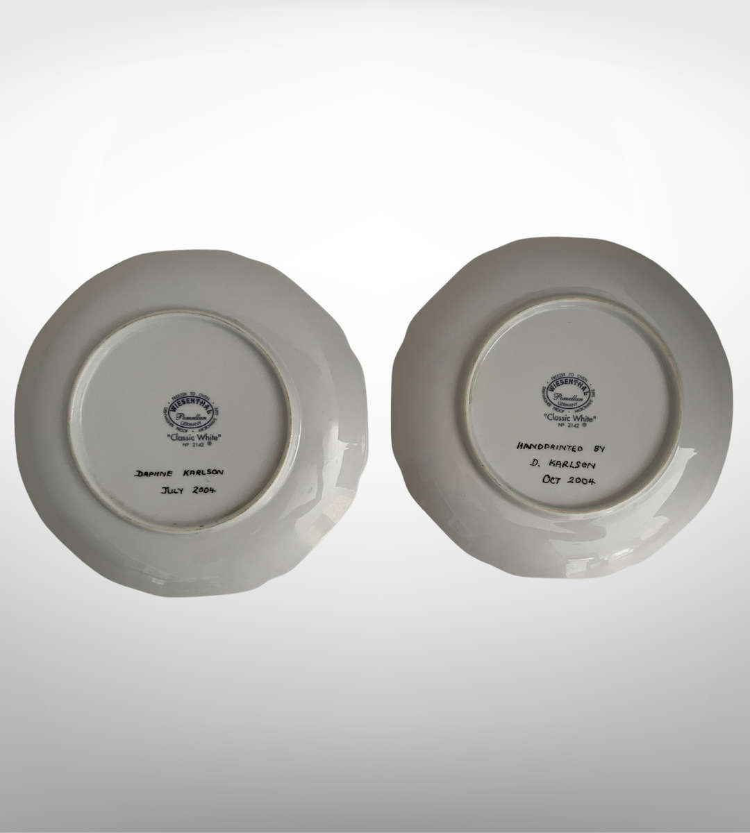 Set of 2 Decorative Hand-Painted Wall Plates by Daphne Karlson (2004)