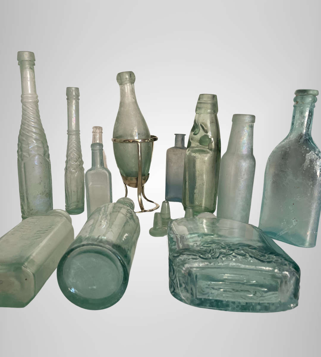 Rare Antique Bottle Collection with Aqua Glass Stoppers & Torpedo Bottle Stand - 12 Unique Bottles