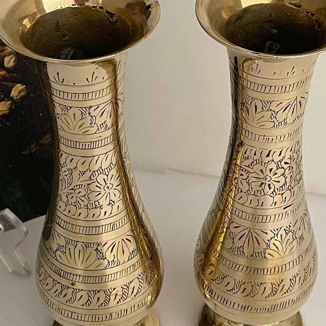 Beautiful pair of vintage Indian solid brass vases featuring intricate hand engraved floral