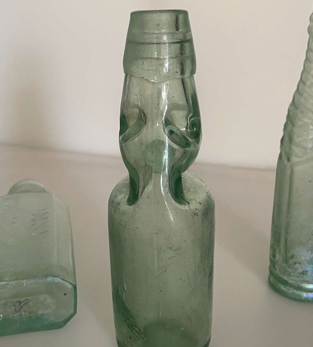Rare Antique Bottle Collection with Aqua Glass Stoppers & Torpedo Bottle Stand - 12 Unique Bottles