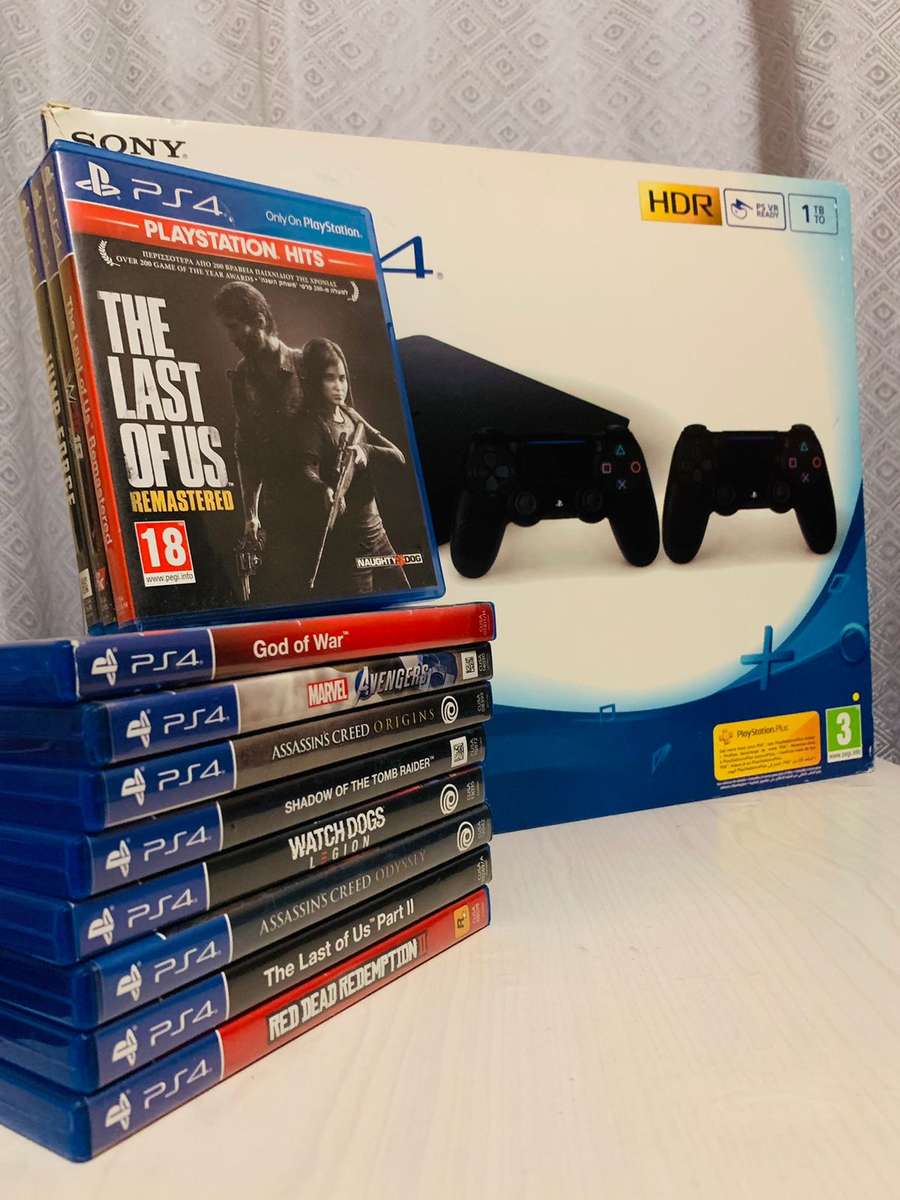 Playstation 4 (1TB HDD) with 2 controllers