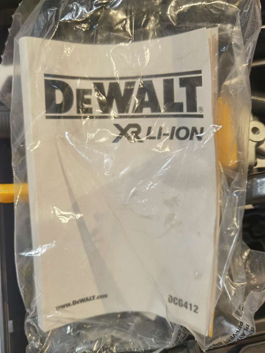 Dewalt DCG412NT-XJ Angle Grinder  (11.5 cm Wheel Diameter)