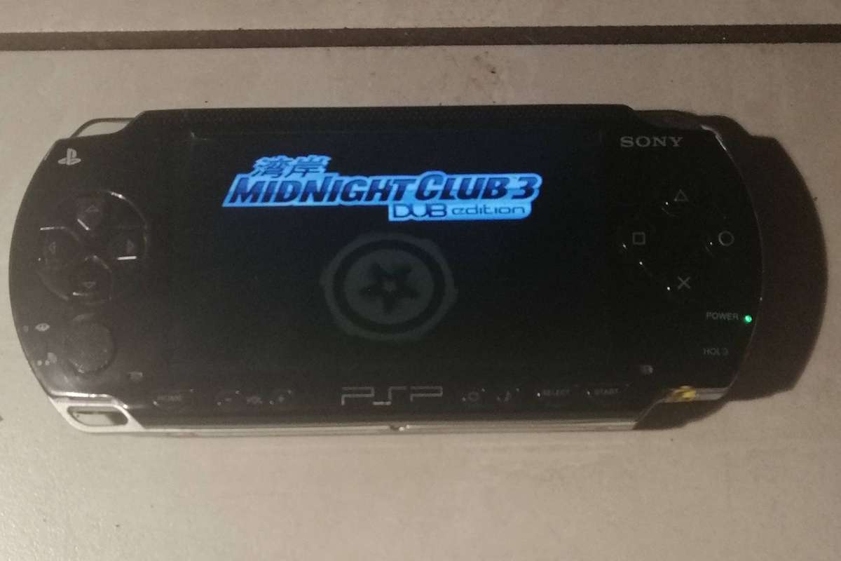 Sony PSP 1000(including 3 games and a Charger)
