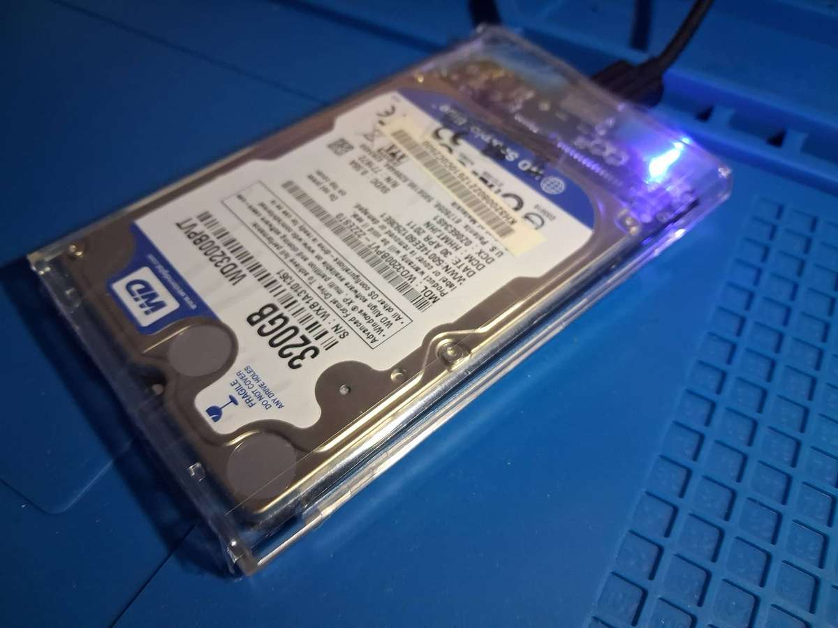 320GB WD 2.5" SATA HDD in NEW Clear Reusable Enclosure