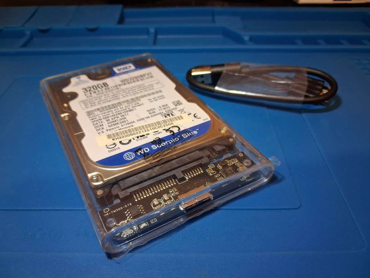 320GB WD 2.5" SATA HDD in NEW Clear Reusable Enclosure
