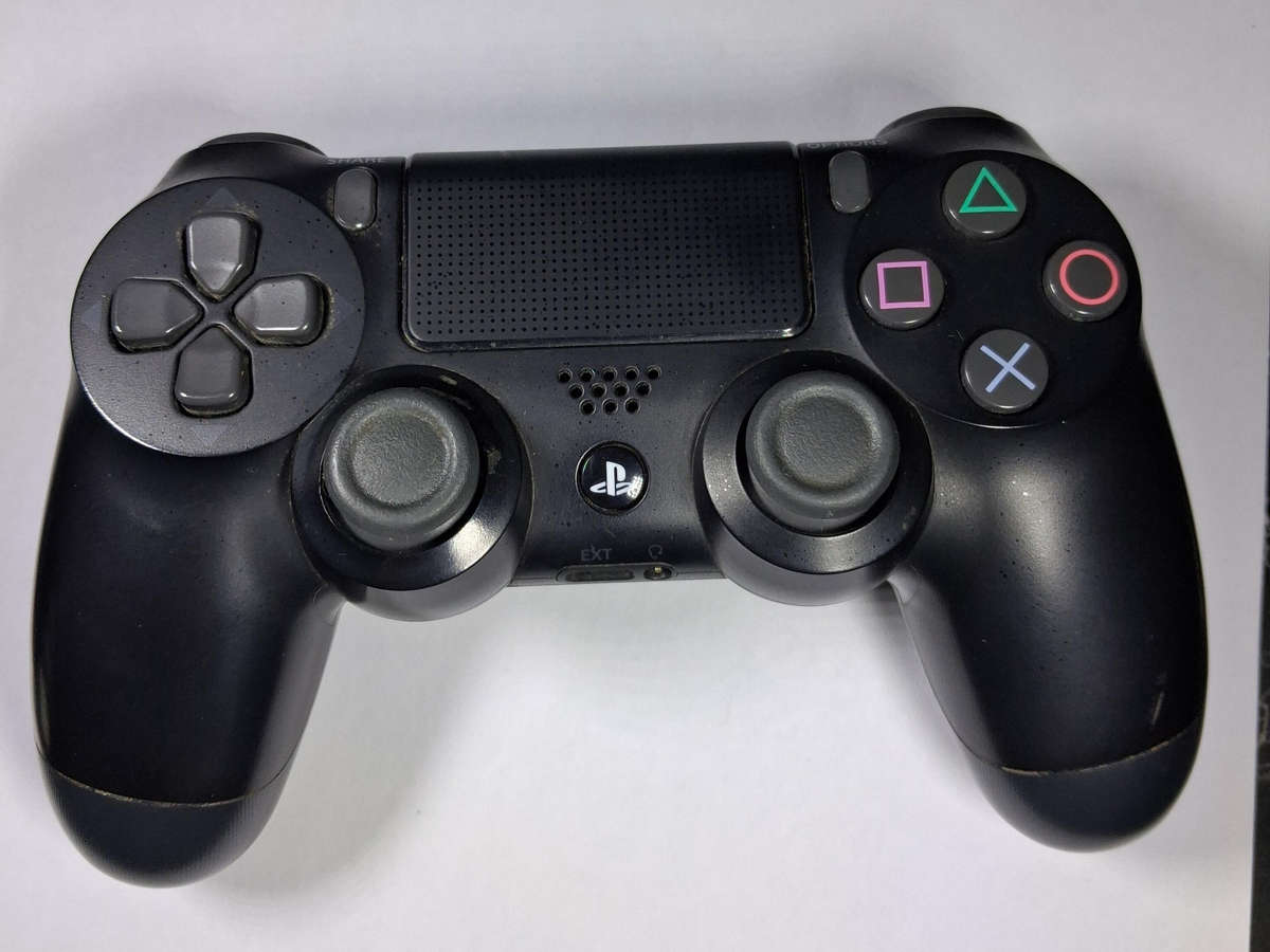 PS4 DualShock 4  Pre-Owned, Excellent Condition & Ready to Play!