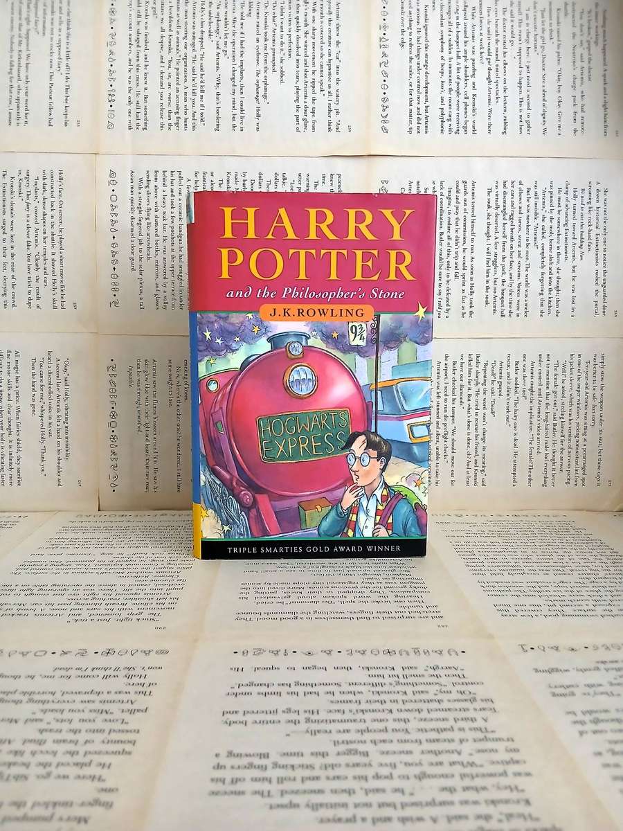 Harry Potter and the Philosopher's Stone by JK Rowling [Hardcover] [First Edition - 19th Printing]