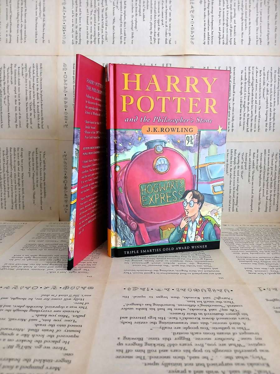 Harry Potter and the Philosopher's Stone by JK Rowling [Hardcover] [First Edition - 19th Printing]