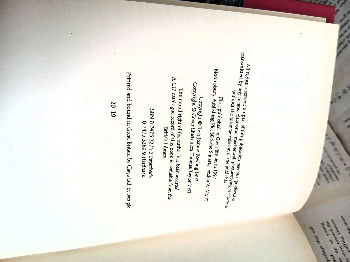 Harry Potter and the Philosopher's Stone by JK Rowling [Hardcover] [First Edition - 19th Printing]