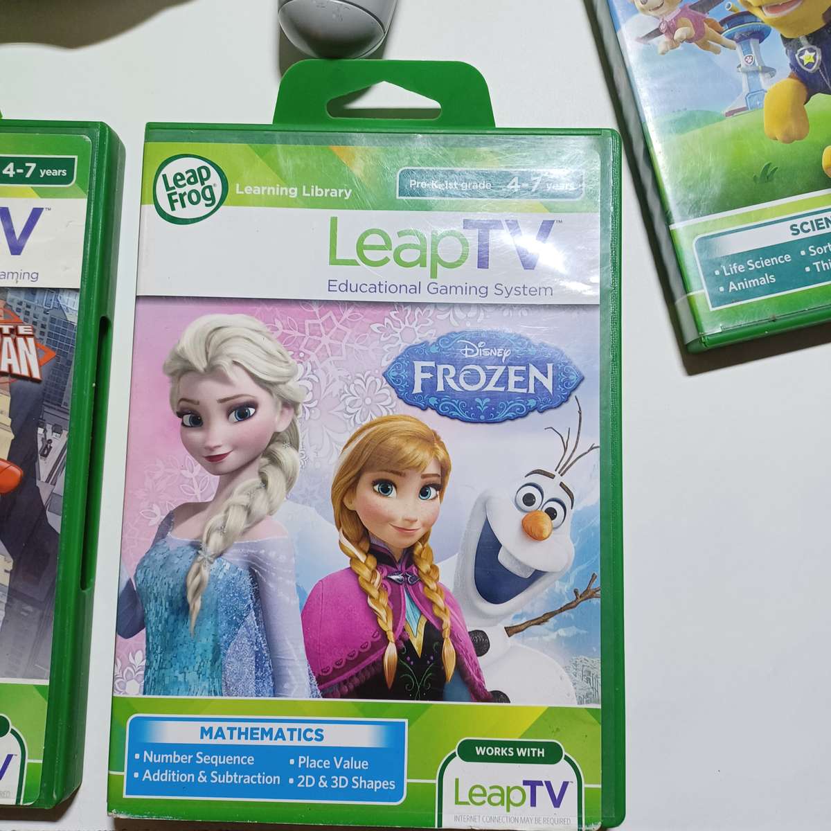 LeapFrog LeapTV Educational Video Gaming System with 4 games / see description