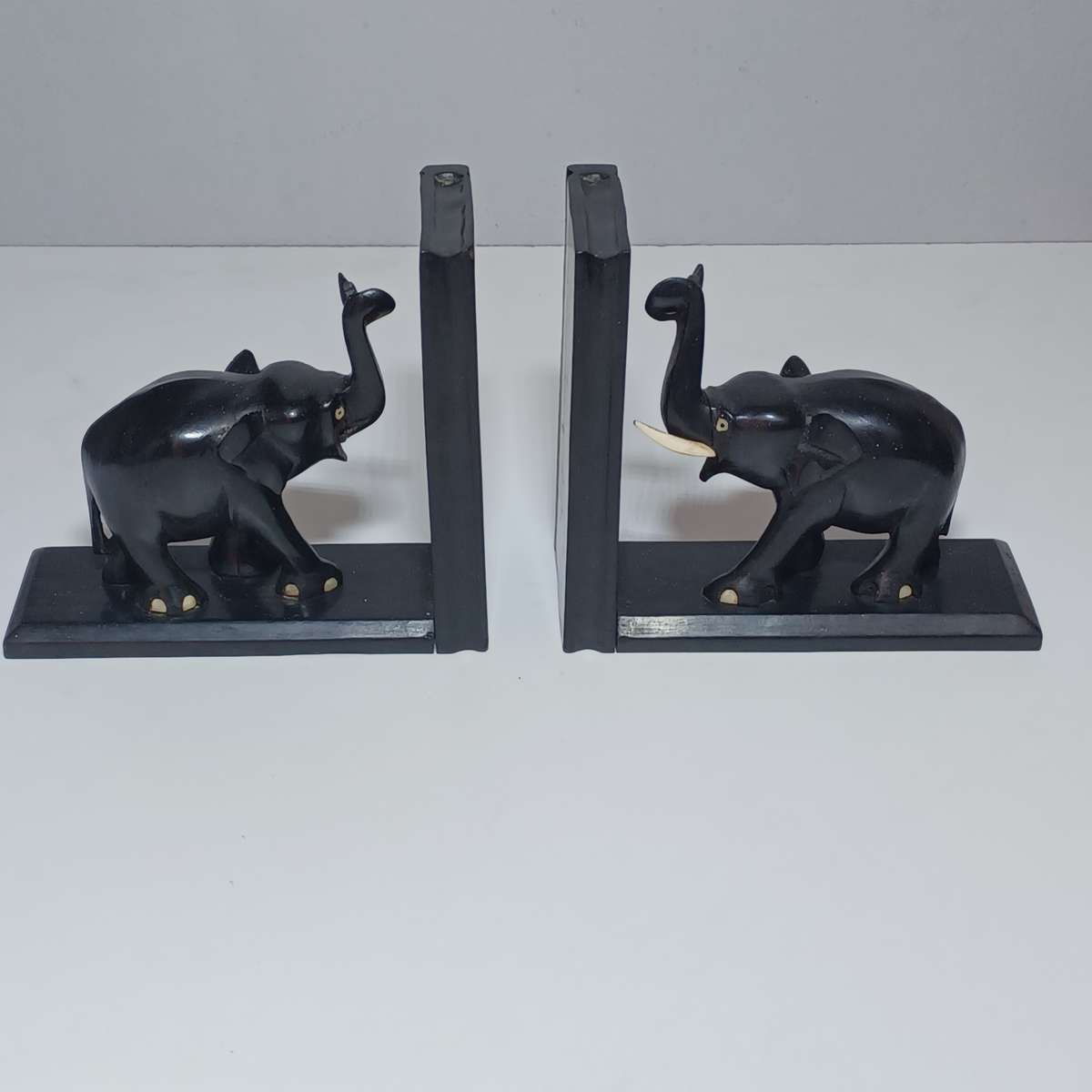 Antique Ebony Elephant Book Ends Circa 1890 - 1 tusk ( 15.5cm x 7cm x 14cm)