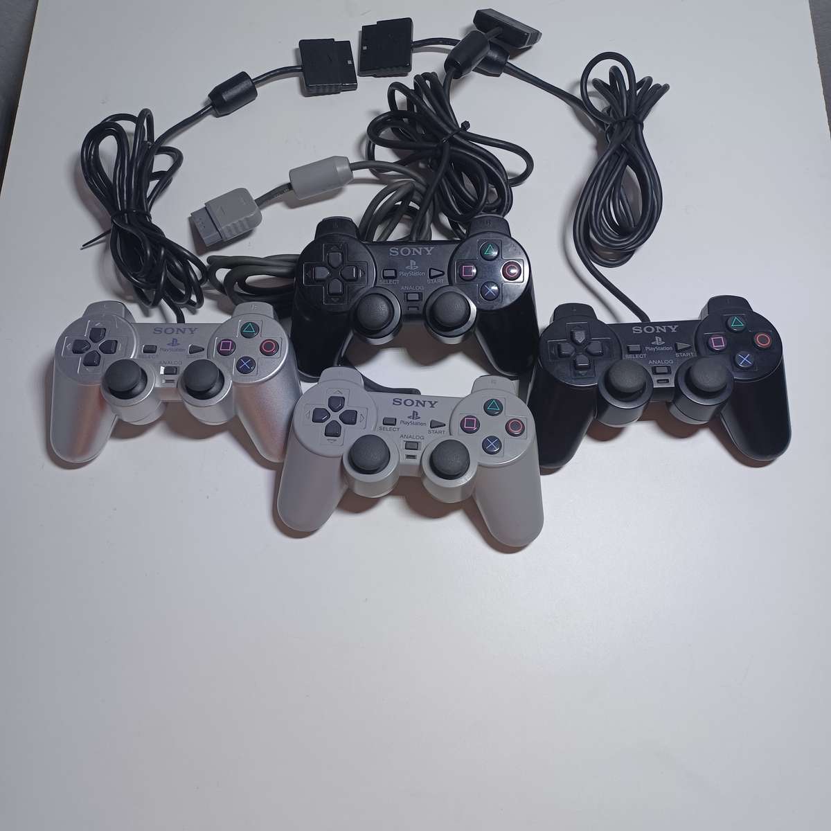 4 x PlayStation 2 controllers, tested working