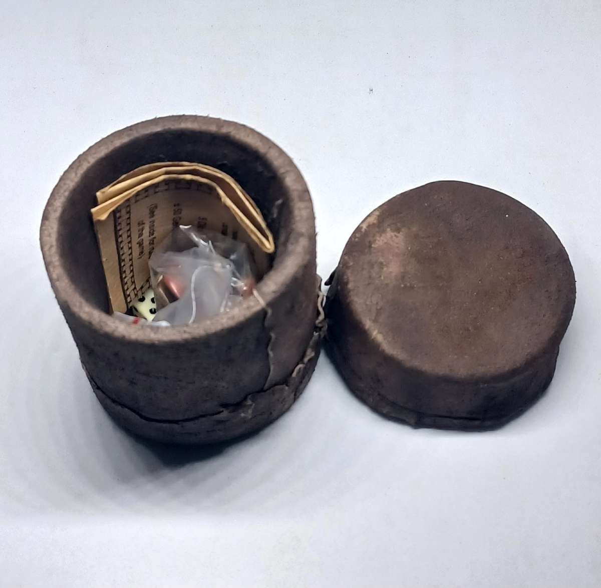 Vintage African Poker game set in impala leather container (7.2cm x 6cm)