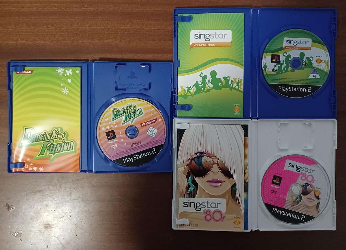 seven PlayStation 2 (PS2) game Bundle (all tested working) - all with booklets