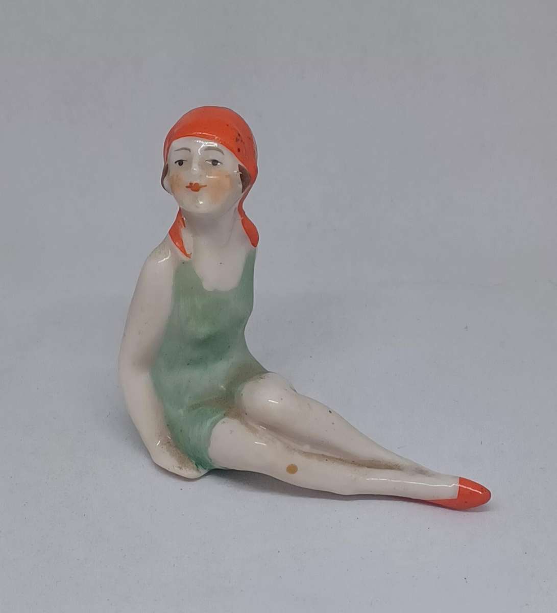 Art Deco porcelain figurine of a "Bathing Beauty" or "Bathing Belle"