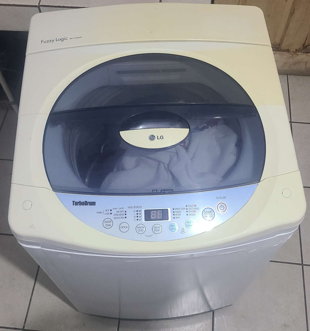 13kg LG turbodrum fuzzy logic Top Loader Washing Machine