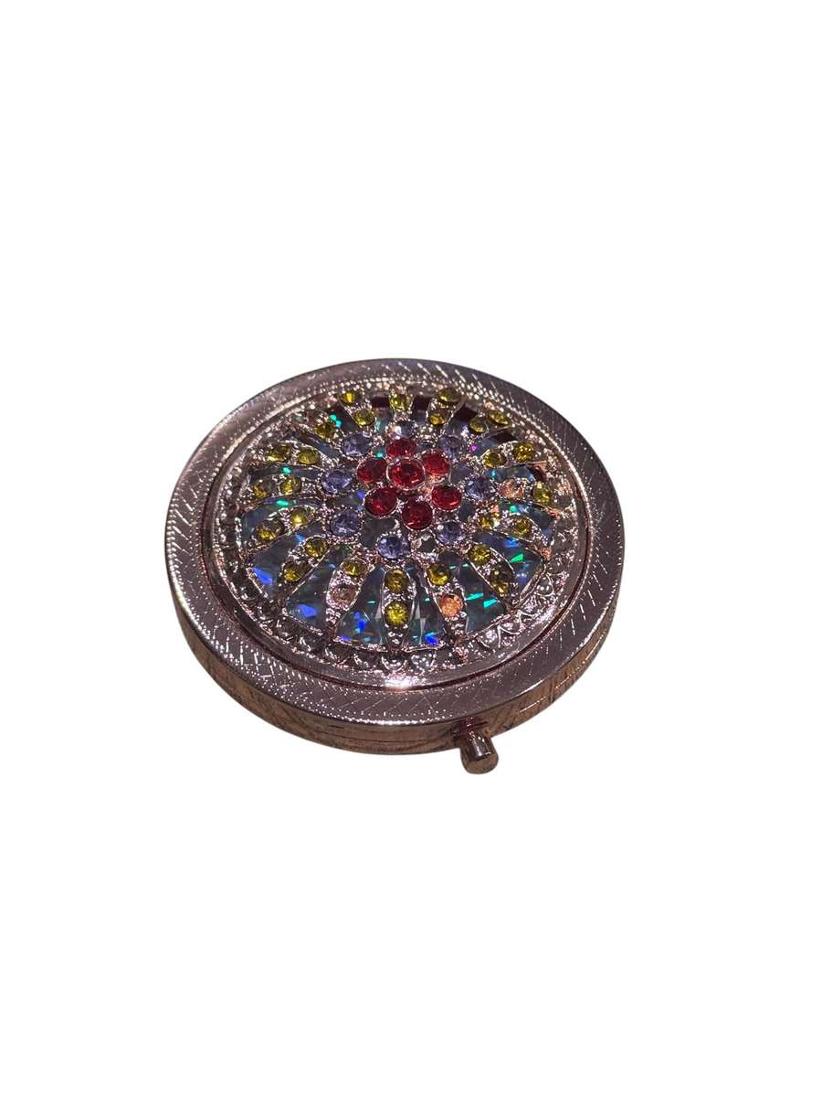 Mirror compact