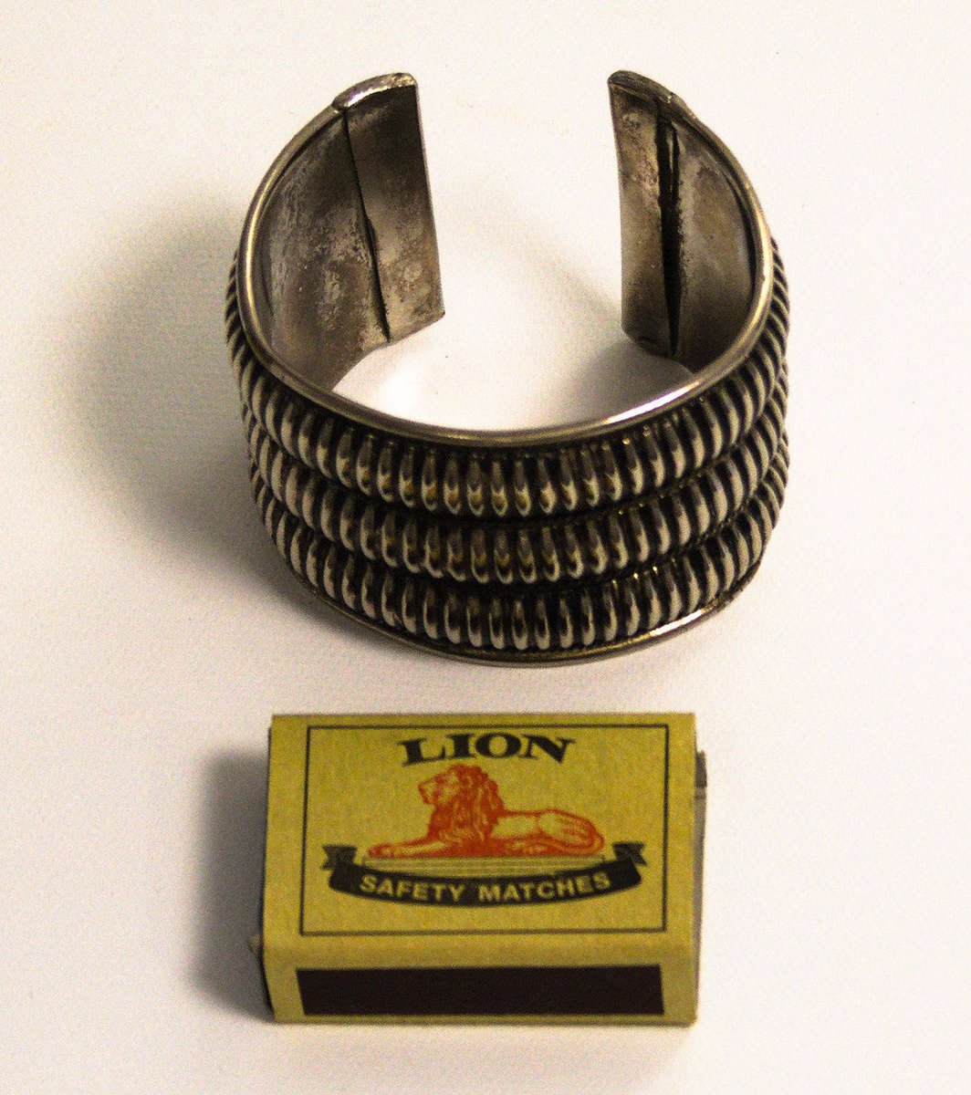Silver-tone metal cuff bangle
