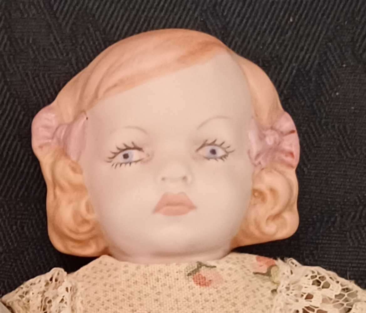 Porcelain Small Dolls (boy & girl)