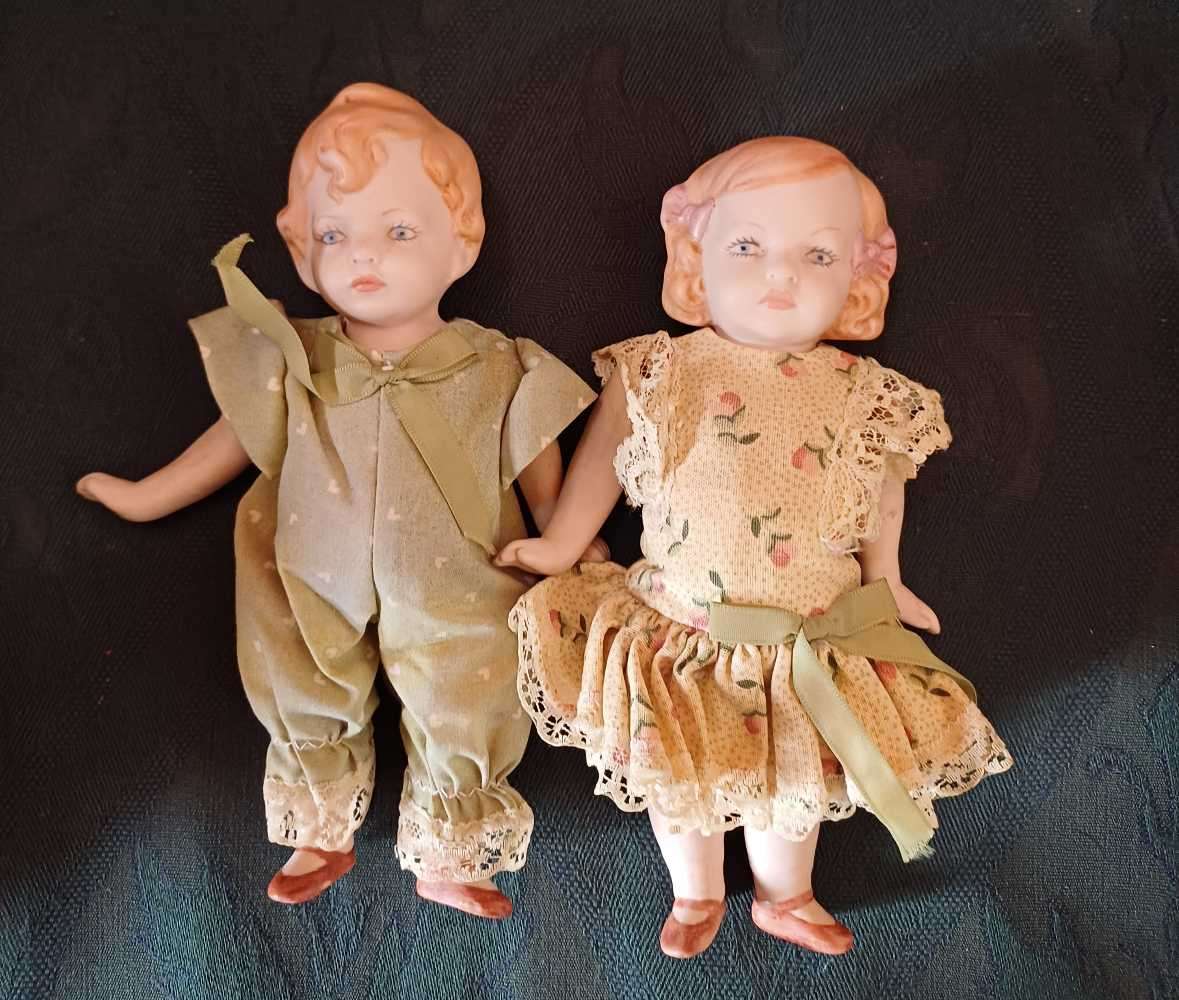 Porcelain Small Dolls (boy & girl)