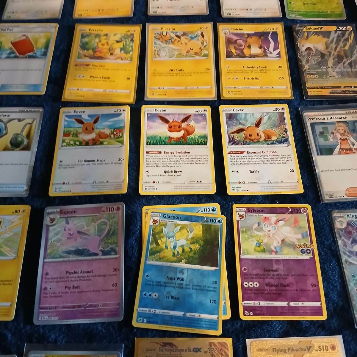 Pokemon card collection 106 cards & 2 tins & tokens (PLUS mystery pack of cards)