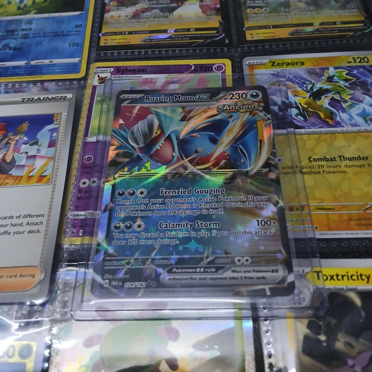 Pokemon card collection 106 cards & 2 tins & tokens (PLUS mystery pack of cards)