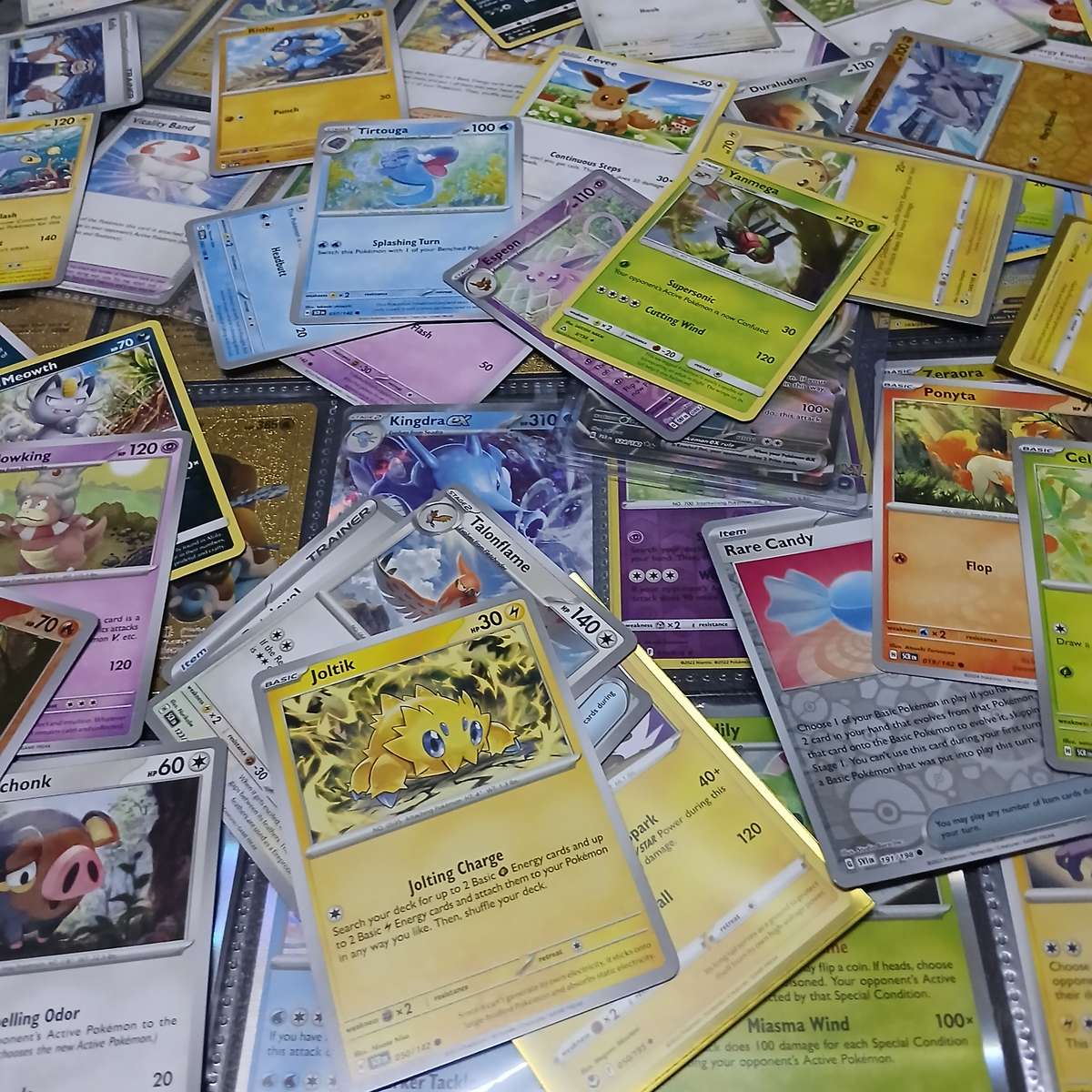 Pokemon card collection 106 cards & 2 tins & tokens (PLUS mystery pack of cards)