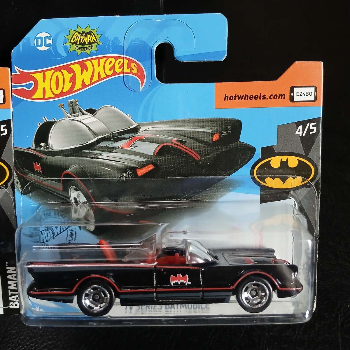 two Hot Wheels diecast models of the Batmobile from the 1966 Batman TV series
