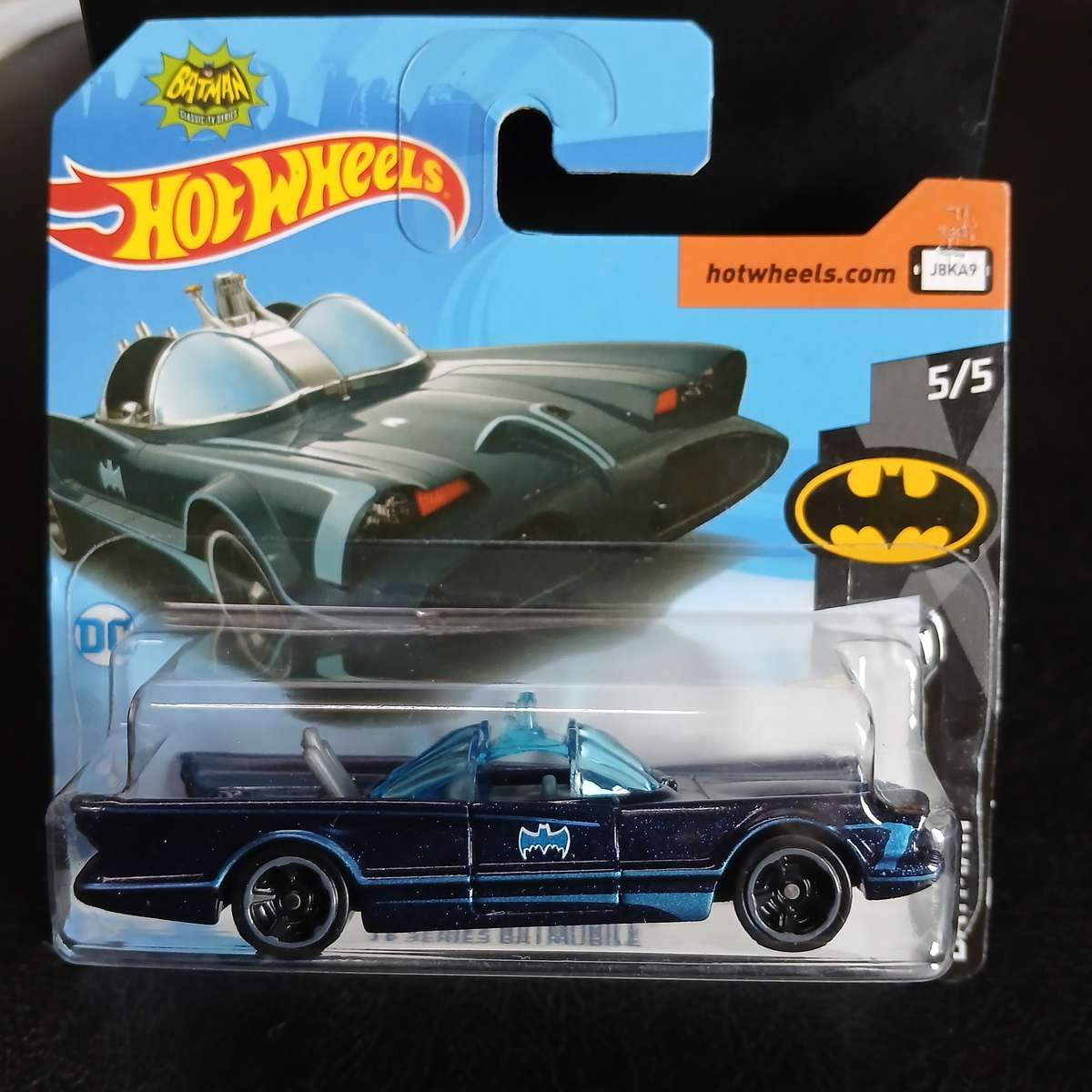two Hot Wheels diecast models of the Batmobile from the 1966 Batman TV series