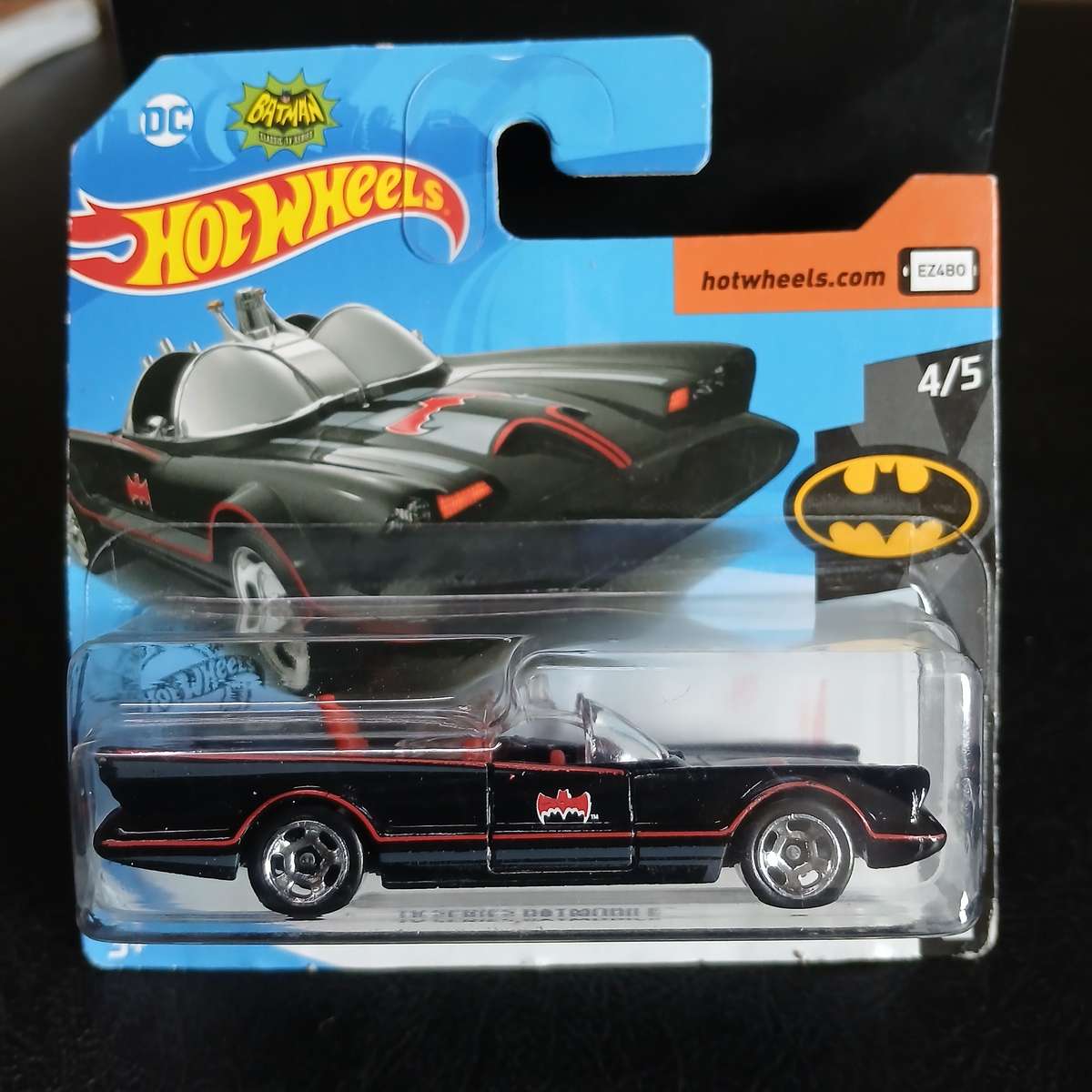 two Hot Wheels diecast models of the Batmobile from the 1966 Batman TV series